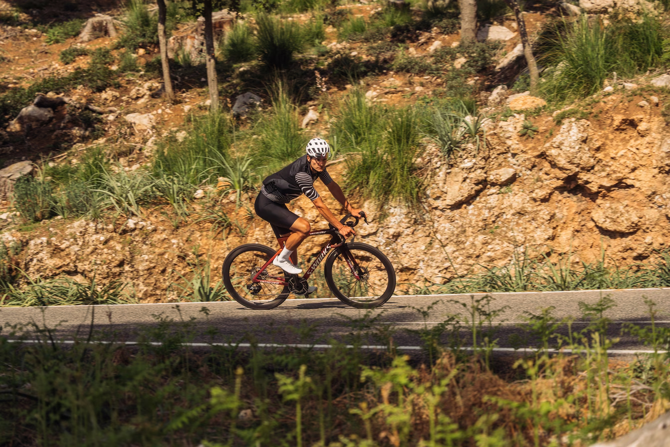 Cyclist riding on scenic road